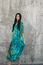 Load image into Gallery viewer, kaftan dress showing open side lines and flowing silhouette

