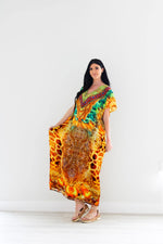 Load image into Gallery viewer, Silk caftan dress in yellow animal print design
