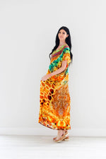Load image into Gallery viewer, Silk caftan dress in yellow animal print design
